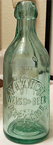 W. H. KNIGHT WEISS BEER EMBOSSED BEER BOTTLE