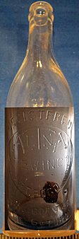 THE AETNA BREWING COMPANY EMBOSSED BEER BOTTLE