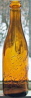 THE HUBERT FISCHER BREWERY EMBOSSED BEER BOTTLE