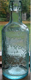 EDWARD BLAKESLEE WEISS BEER EMBOSSED BEER BOTTLE