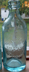 F. KUTSCHER WEISS BIER EMBOSSED BEER BOTTLE