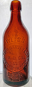 FRED HARVEY WEISS BEER EMBOSSED BEER BOTTLE