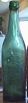 COMPANIA CERVECERA INTERNACIONAL EMBOSSED BEER BOTTLE