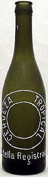 CERVEZA TROPICAL EMBOSSED BEER BOTTLE