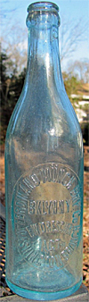 FERDINAND MUNCH BREWERY COMPANY EMBOSSED BEER BOTTLE