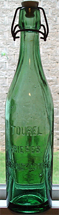 TOUREL BIERES EMBOSSED BEER BOTTLE