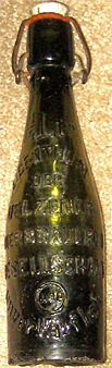 UELZENER BIERBRAUEREI EMBOSSED BEER BOTTLE