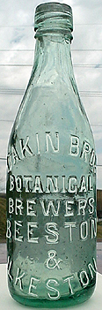 DAKIN BROTHERS BOTANICAL BREWERS EMBOSSED BEER BOTTLE