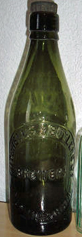 MITCHELLS & BUTLERS LIMITED BREWERS EMBOSSED BEER BOTTLE