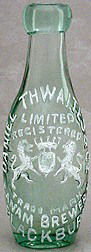 DANIEL THWAITES LIMITED EANAM BREWERY EMBOSSED BEER BOTTLE