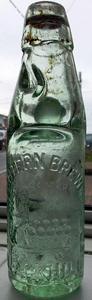 NORTH EASTERN BREWERIES LIMITED EMBOSSED BEER BOTTLE