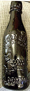 NORTH EASTERN BREWERIES LIMITED EMBOSSED BEER BOTTLE