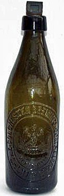 THE COLCHESTER BREWING COMPANY LIMITED EMBOSSED BEER BOTTLE