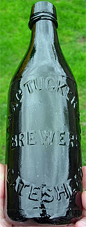 ISAAC TUCKER & COMPANY BREWERS EMBOSSED BEER BOTTLE