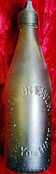 THE BREWERY EMBOSSED BEER BOTTLE