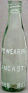 WM. WEARING'S HERB BEER EMBOSSED BEER BOTTLE