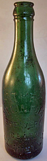 THE FELINFOEL BREWERY COMPANY LIMITED EMBOSSED BEER BOTTLE