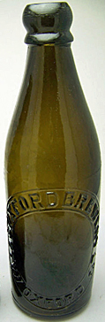 HALLS OXFORD BREWERY LIMITED EMBOSSED BEER BOTTLE