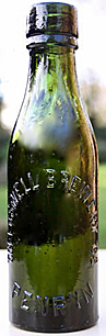 TRESLUSWELL BREWERY COMPANY EMBOSSED BEER BOTTLE