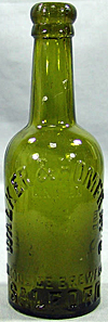 WALKER & HOMFRAY'S LIMITED WOODSIDE BREWERY EMBOSSED BEER BOTTLE