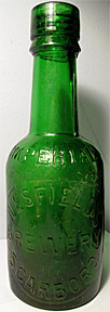 NESFIELD'S BREWERY EMBOSSED BEER BOTTLE