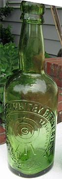 THE SCARBORO & WHITBY BREWERIES LIMITED EMBOSSED BEER BOTTLE