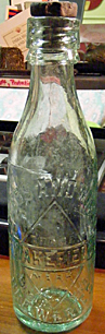 LEEDS & WAKEFIELD BREWERIES EMBOSSED BEER BOTTLE