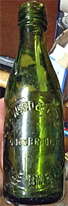 LOCKWOOD & COMPANY LIMITED CASTLE BREWERY EMBOSSED BEER BOTTLE