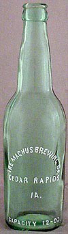 THE MAGNUS BREWING COMPANY EMBOSSED BEER BOTTLE