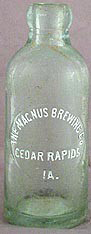 THE MAGNUS BREWING COMPANY EMBOSSED BEER BOTTLE