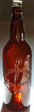 THE MAGNUS BREWING COMPANY EMBOSSED BEER BOTTLE