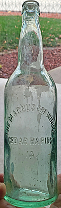 THE MAGNUS BREWING COMPANY EMBOSSED BEER BOTTLE