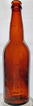 THE MAGNUS BREWING COMPANY EMBOSSED BEER BOTTLE