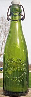 H. J. WITT WEISS BEER EMBOSSED BEER BOTTLE