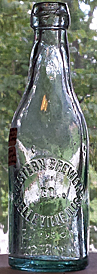 WESTERN BREWERY COMPANY EMBOSSED BEER BOTTLE