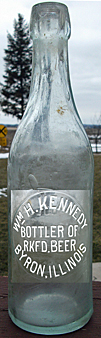 WILLIAM H. KENNEDY BOTTLER OF ROCKFORD BEER EMBOSSED BEER BOTTLE