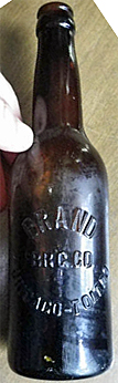 BRAND BREWING COMPANY EMBOSSED BEER BOTTLE