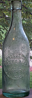 EXCELSIOR LAGER BIER FROM H. TORCHIANI EMBOSSED BEER BOTTLE