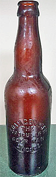 ADAM GERINGER THE POPULAR BEER MAN EMBOSSED BEER BOTTLE