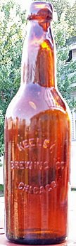 KEELEY BREWING COMPANY EMBOSSED BEER BOTTLE