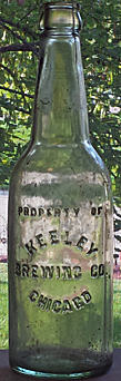 KEELEY BREWING COMPANY EMBOSSED BEER BOTTLE