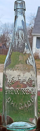 KEELEY BREWING COMPANY EMBOSSED BEER BOTTLE