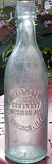 FRED MILLER BREWING COMPANY EMBOSSED BEER BOTTLE