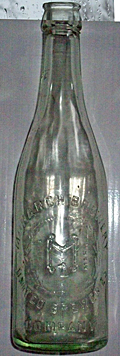 MONARCH BREWERY EMBOSSED BEER BOTTLE