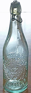 MONARCH BREWERY EMBOSSED BEER BOTTLE