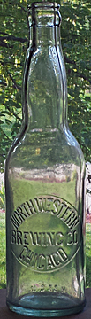 NORTH WESTERN BREWING COMPANY EMBOSSED BEER BOTTLE