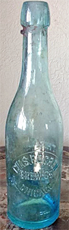 CHARLES F. OGREN BREWING COMPANY EMBOSSED BEER BOTTLE