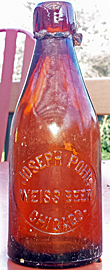 JOSEPH POHL WEISS BEER EMBOSSED BEER BOTTLE