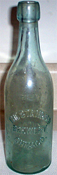 THE STANDARD BREWERY EMBOSSED BEER BOTTLE