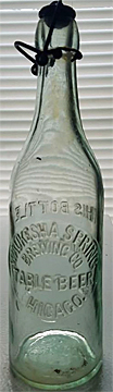 WAUKESHA SPRING BREWING COMPANY EMBOSSED BEER BOTTLE